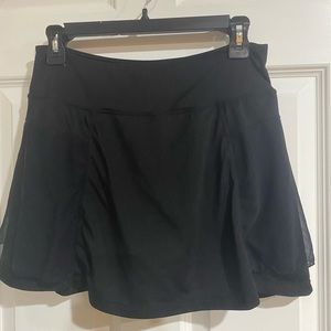 Kyodan Woman’s Skort with biker shirts and overlay skirt. M/M. Good condition!